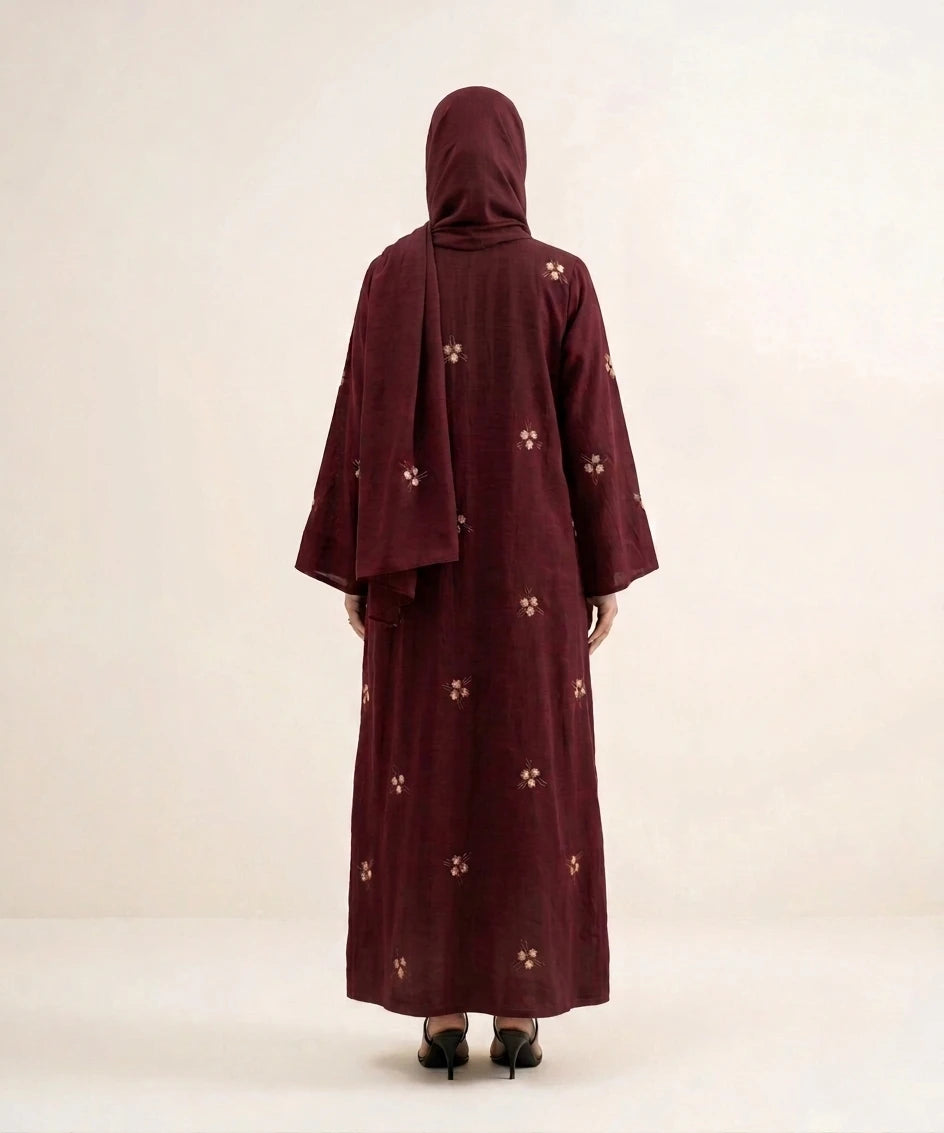 Ethereal embroidery open front abaya .