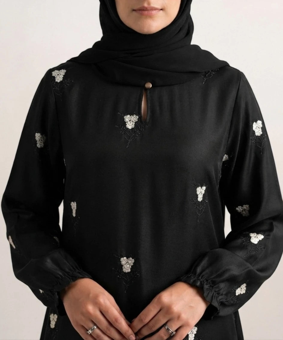 Grace embroidery abaya.